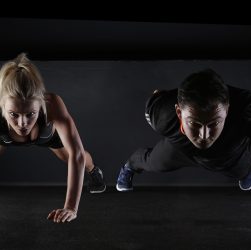 Man, woman, push-ups — The Transformative Impact of Dr. Scott Kamelle Milwaukee WI on Gynecologic Cancer Awareness and Treatm