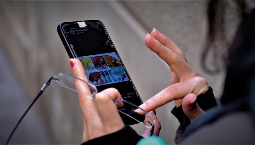 Smartphone, facebook, hands — White Label Facebook Ads: The Fast Track to Agency Expansion